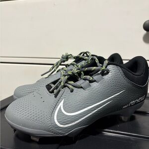 Nike Gray Baseball Cleats with White Swoosh and Neon Green Laces
